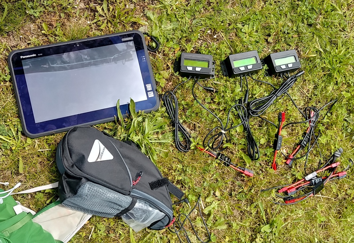 These are the databox logging devices that Justin was attempting to install on each of the solar vehicles. They were custom made by us for the Suntrip race and log all of the electrical consumption, solar generation, and vehicle position and speed stats to a flash memeory card for post trip data analysis.